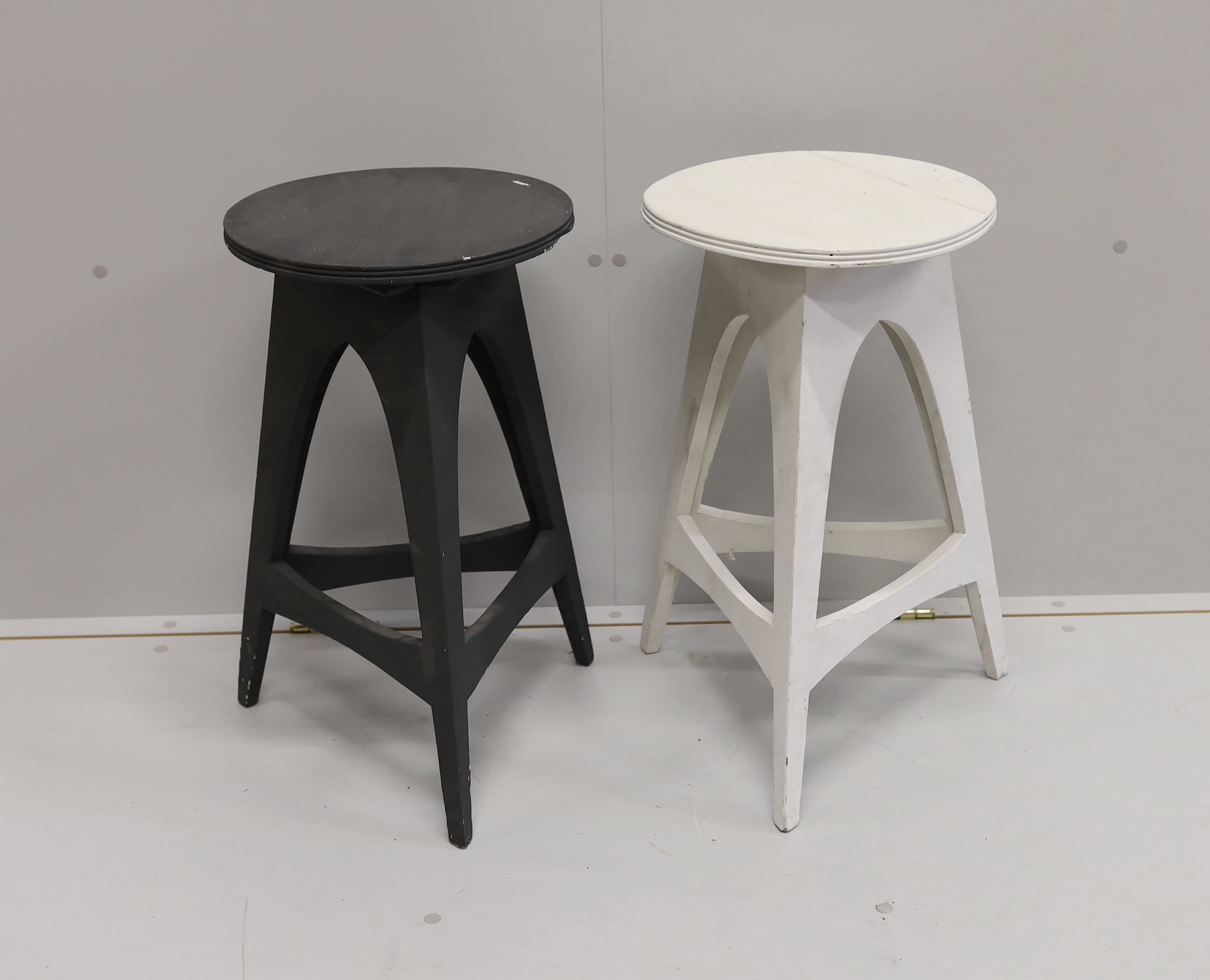 A pair of contemporary circular painted cricket tables, diameter 35cm, height 60cm